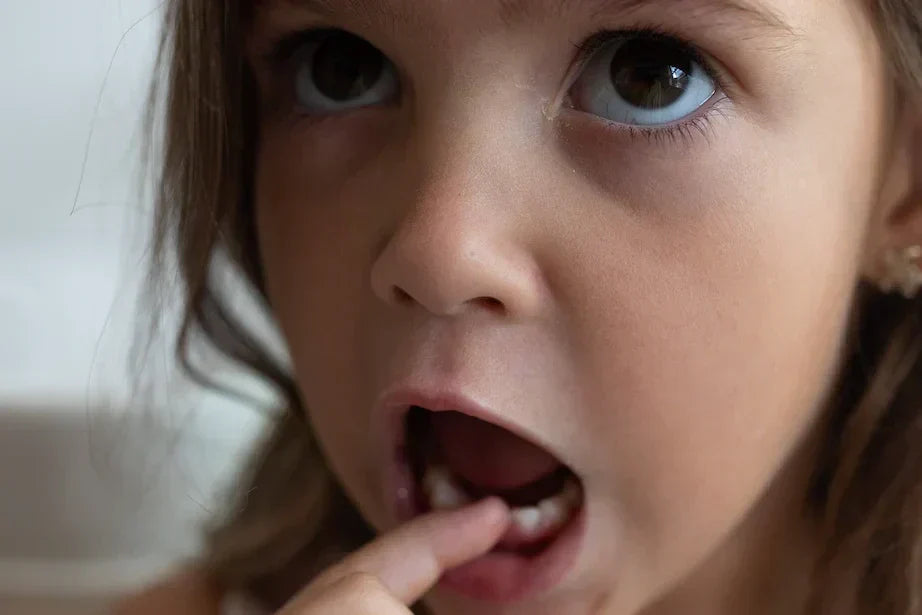 Child losing first wobbly tooth tooth fairy tradition Australia